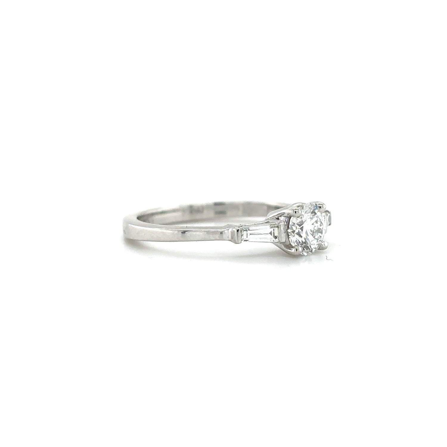 Platinum 0.52ct Brilliant Cut Diamond With Tapered Baguette Cut Diamond Shoulders Ring