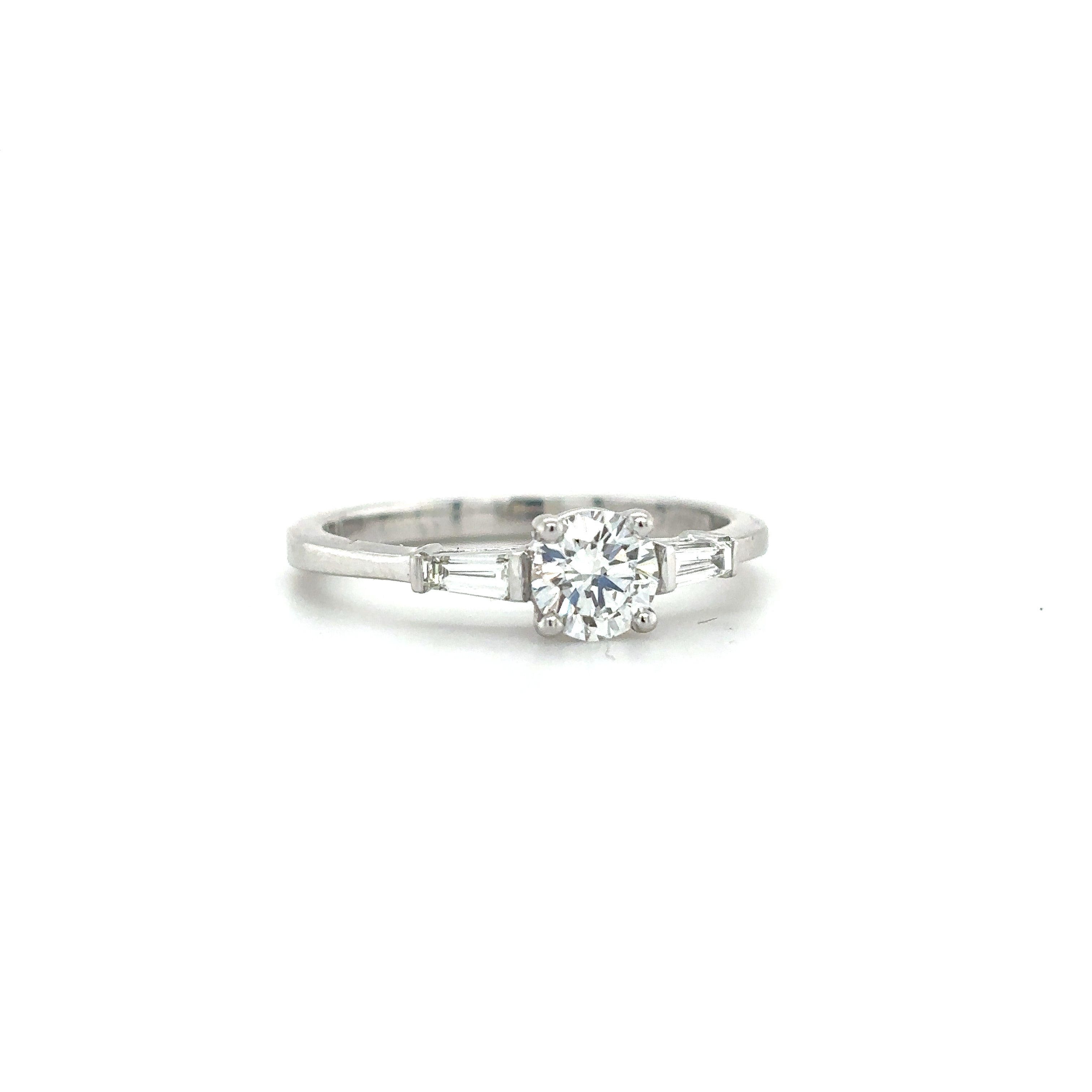 Platinum 0.52ct Brilliant Cut Diamond With Tapered Baguette Cut Diamond Shoulders Ring